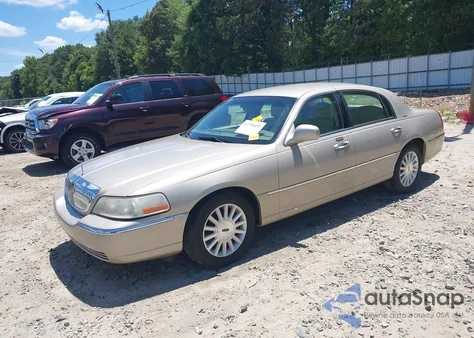 2004 Lincoln Town Car Signature из США, поврежденный, VIN 1LNHM81W74Y650763
